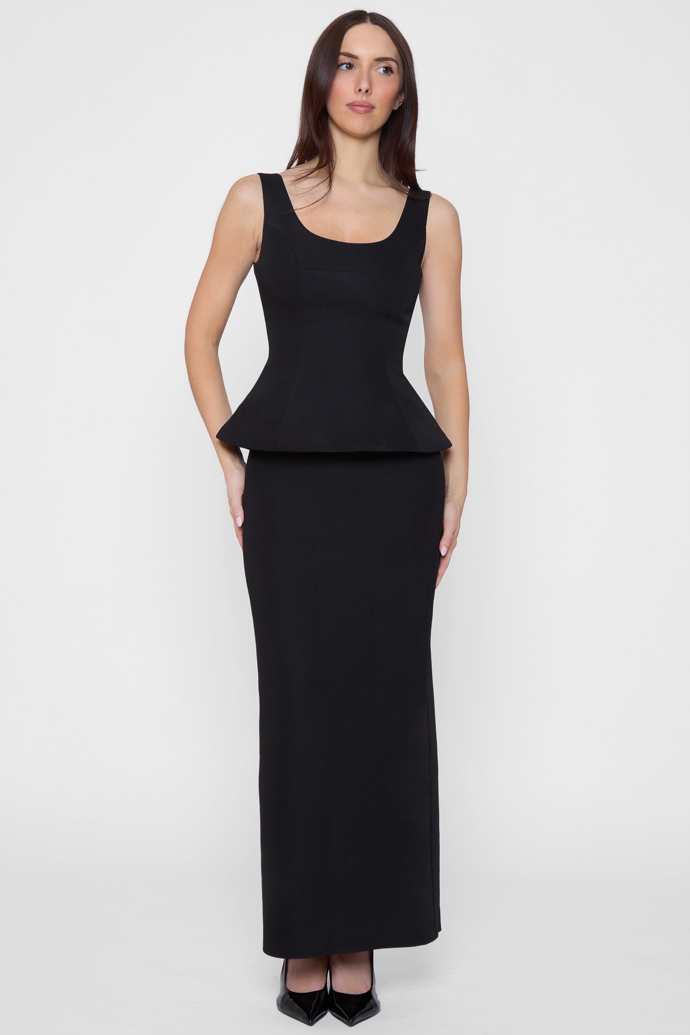 Model wearing LEAU Calesia Contour Bustier Top in Black, front view.