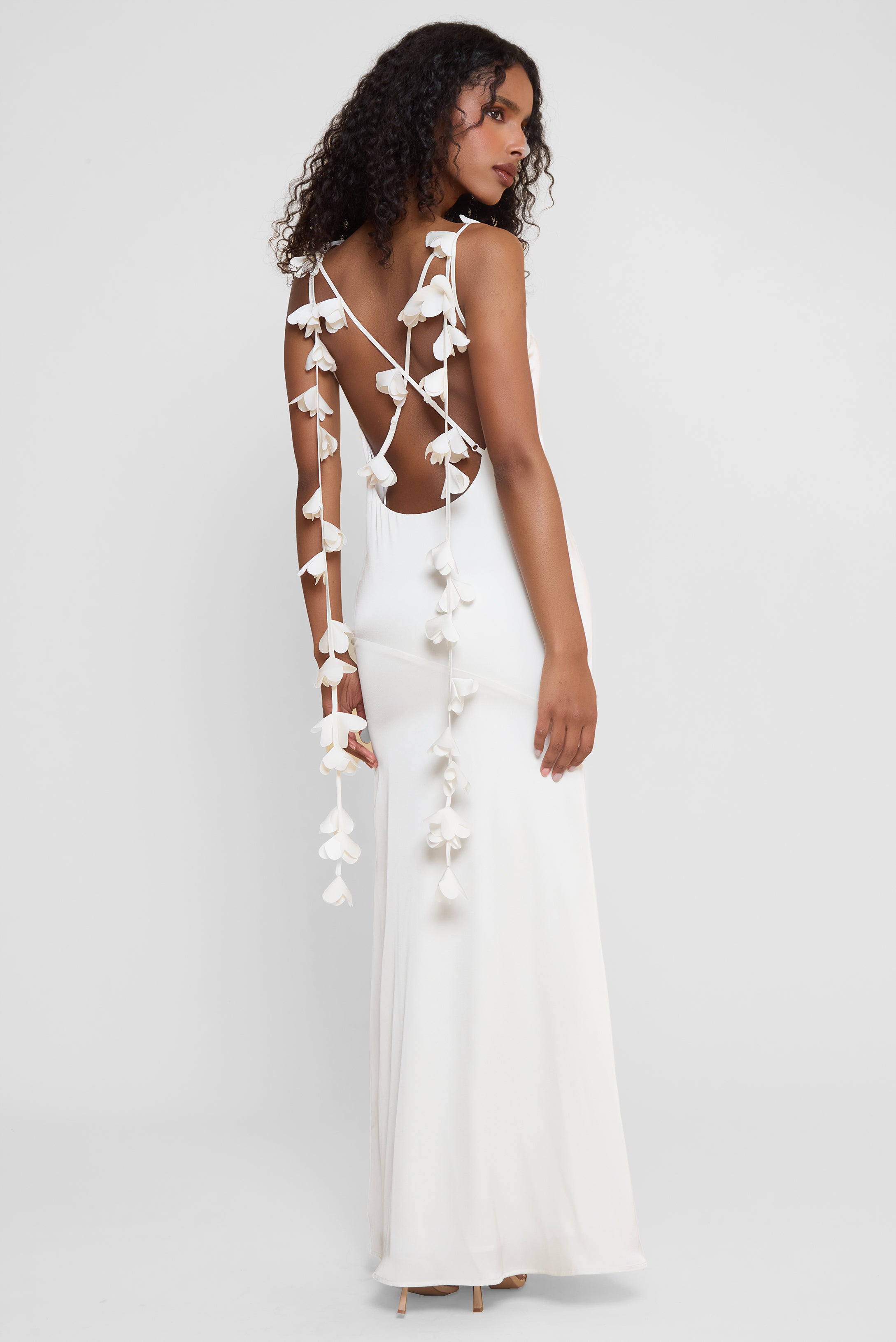 Model wearing Jardin Petal Satin Maxi Gown in White, back view
