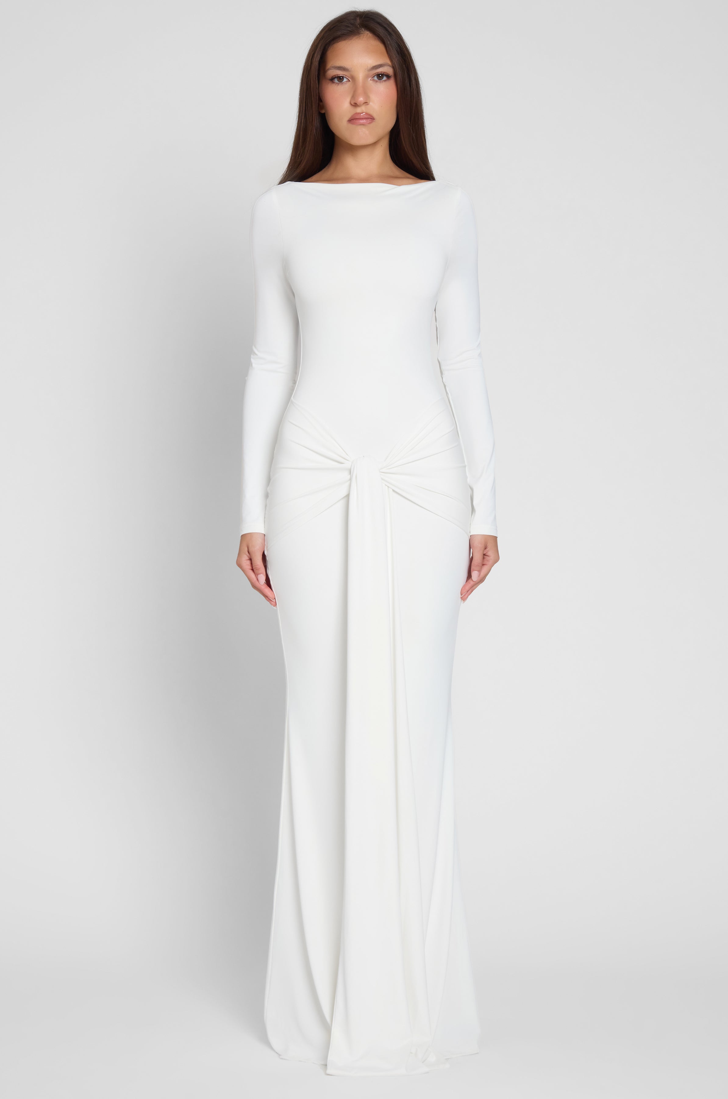 Model is wearing Oasis Knot Maxi Dress in White, front view.