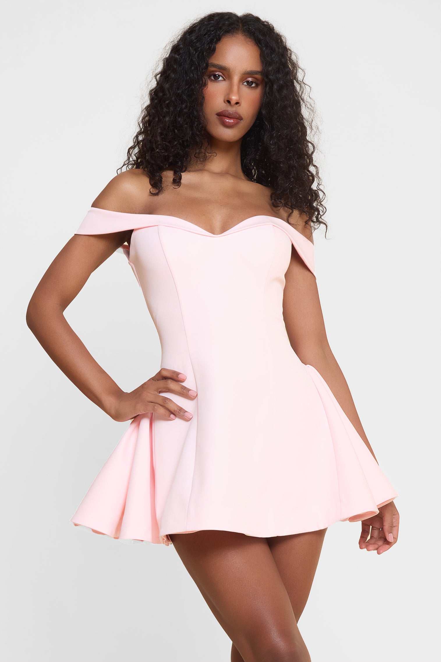 Model wearing Raquel Babydoll Corset Mini Dress in Pink, front view